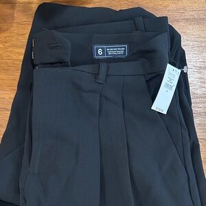365 Black High-Rise Pleated Wide Leg Trousers from Gap
Size 6
Brand New - tag on